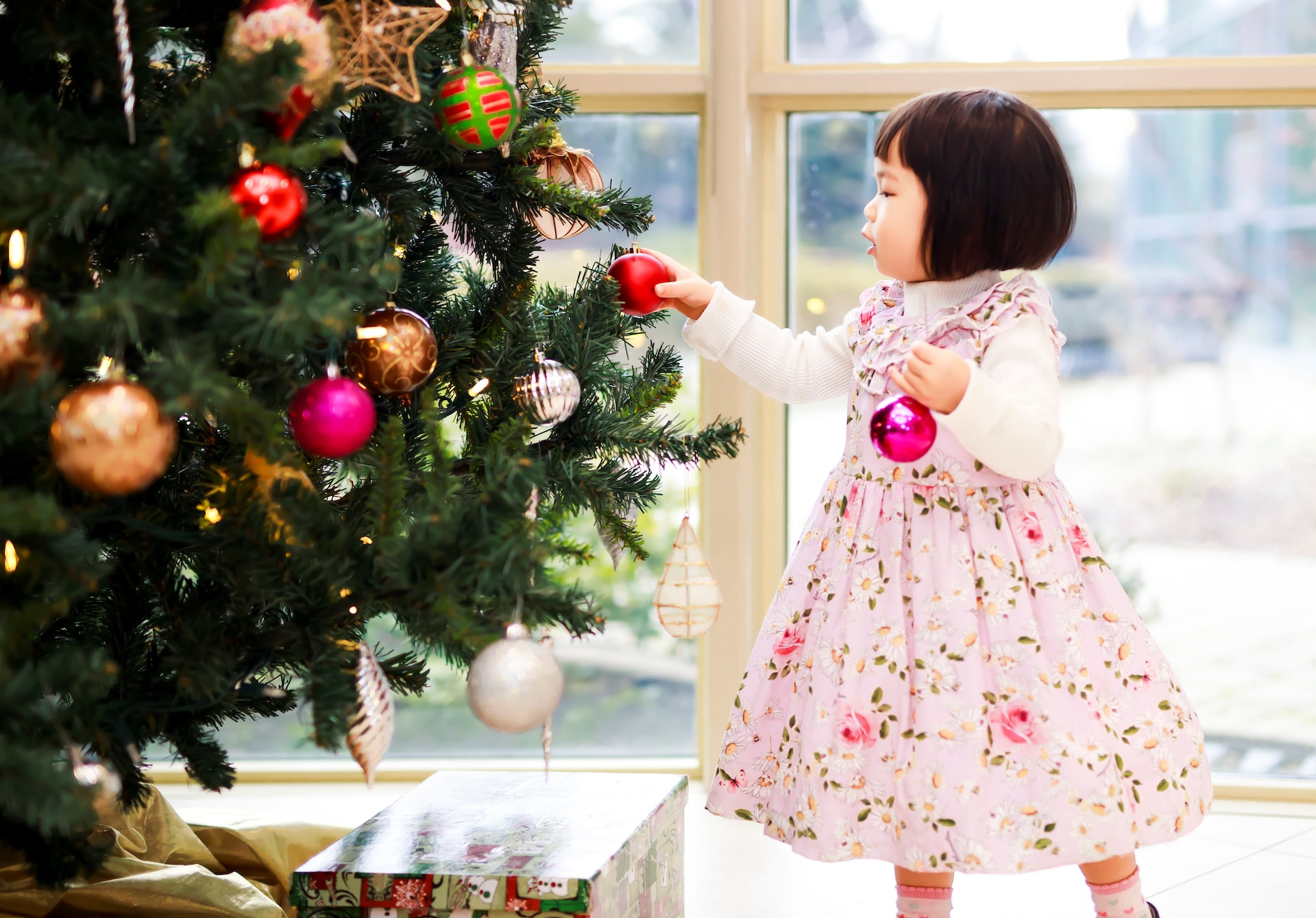 Toddler Decorating Christmas Tree